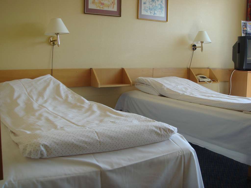 Dombas Hotel Habitación foto